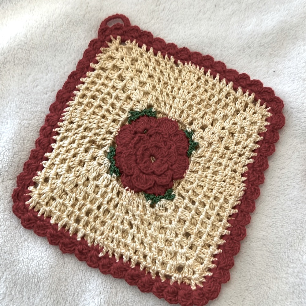 Pair of vintage crocheted rose pot holders.